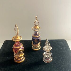 3 Perfume Bottles.